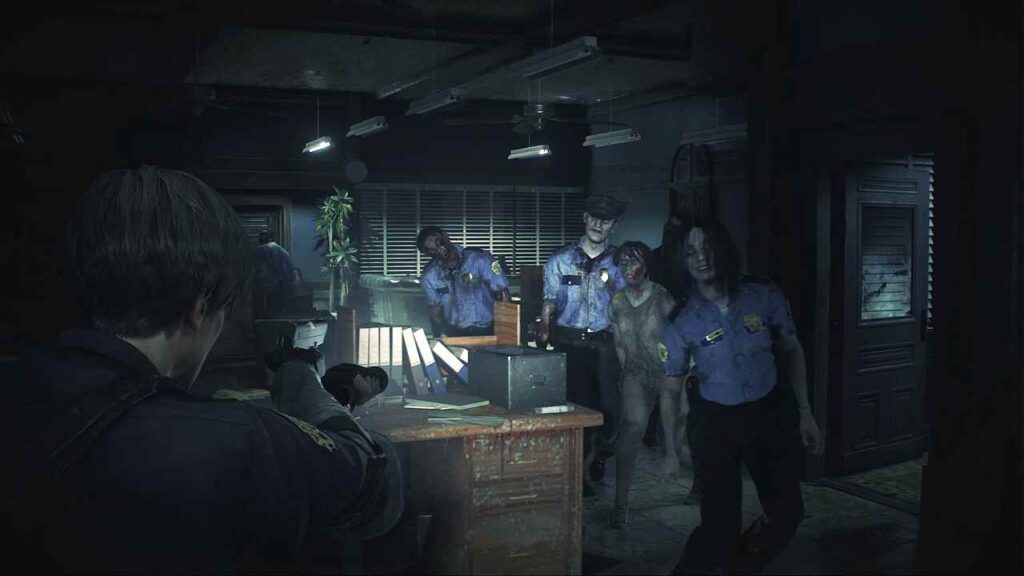Leon Kennedy facing zombies in Resident Evil 2 Remake, one of the best horror games of all time