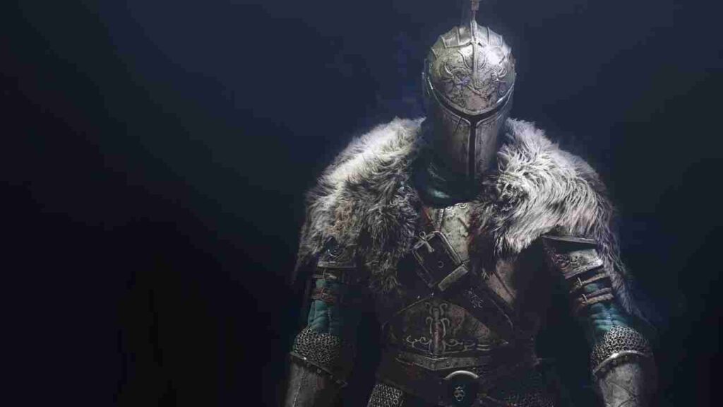 A Soulslike player standing in the dark with full body armor